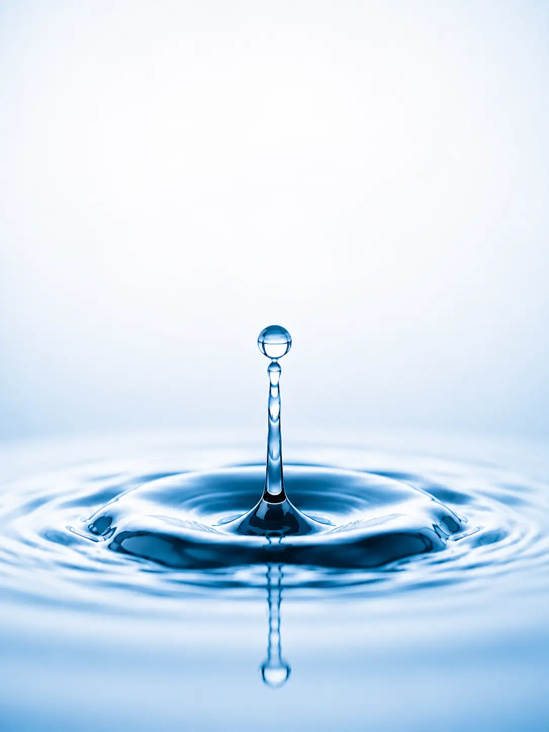 Clean water ripple with droplet